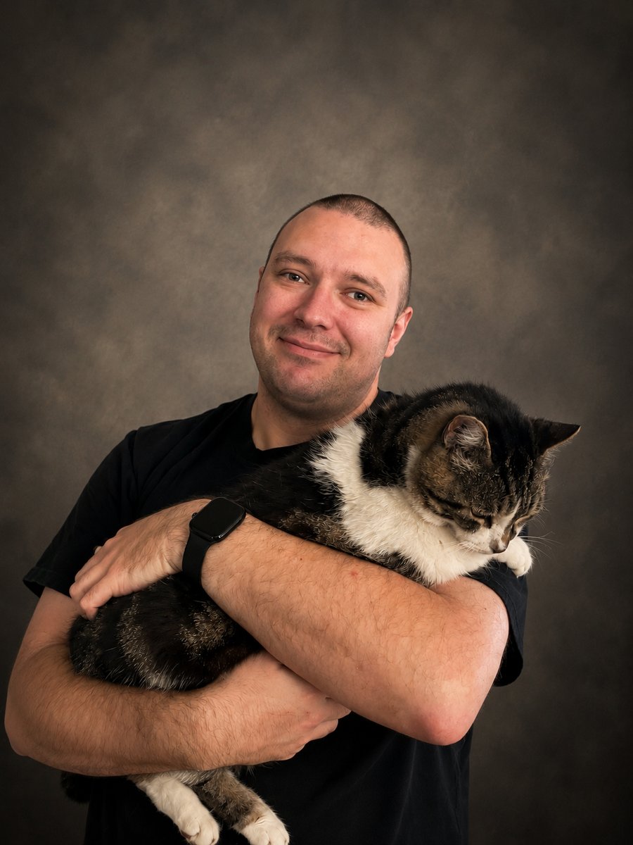 Mike Strassburg holding his cat